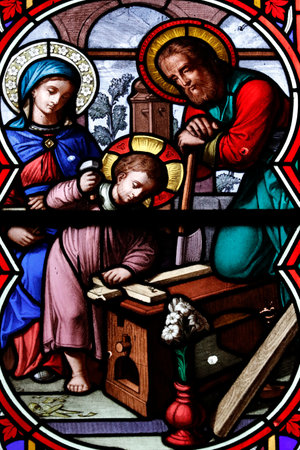 Chambery cathedral. Stained glass window. Jesus the carpenter. France.のeditorial素材