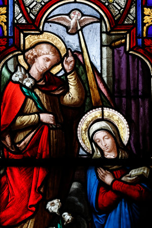 Chambery cathedral. Stained glass window. The Annunciation by the angel Gabriel to the Virgin Mary. France.のeditorial素材