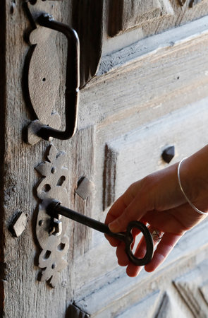 The baroque catholic chapel of the Chattrix. Old door with key. Saint Nicholas of Veroce. France.のeditorial素材