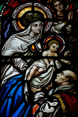 Stained glass window. Virgin Mary and St Anthony Mary Claret. France.のeditorial素材