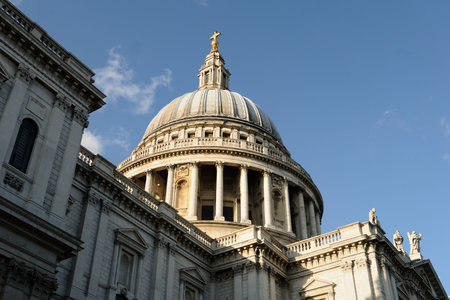Iconic dome of St Paul's, Cathedral, City of London, England, UK, one of the largest in the world, in early evening light. の写真素材