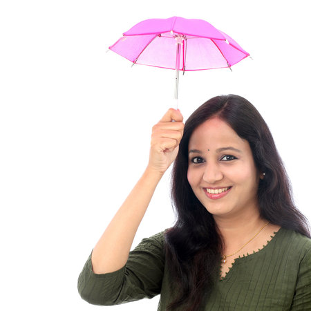 Young woman holding small umbrella - Money savings conceptの写真素材