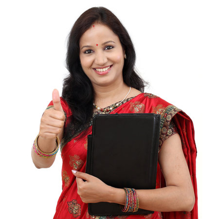 Traditional Indian woman showing thumbs up
