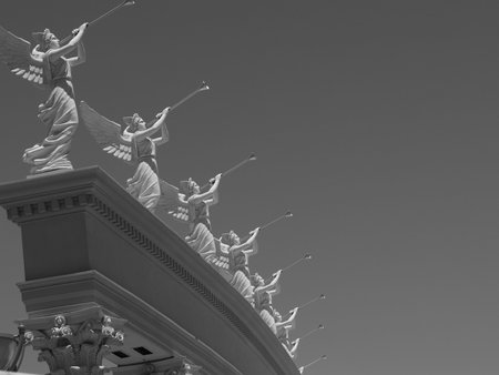 Beatuiful Black and White photo of the angels ontop of Ceaser's Palace in Las Vegas.