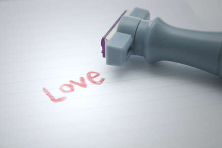 Rubber stamp the word "love"の写真素材