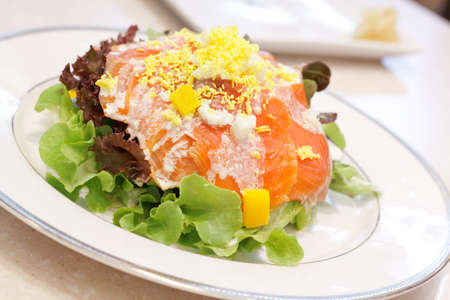 Image of Smoke salmon salad on white dishの写真素材