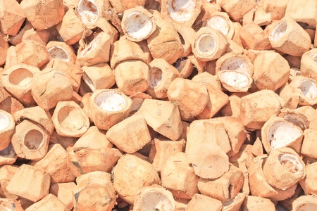 Pile of discarded coconut husk in Thailand coconut form の写真素材