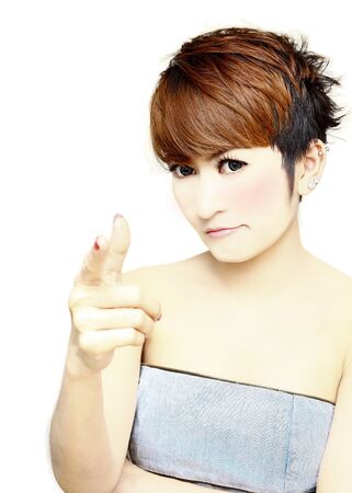 Portrait of  Pretty women short hair pointing her finger on white backgroundの写真素材