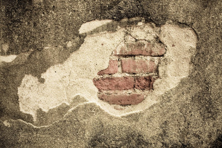 cracked concrete vintage brick wall backgroundの写真素材