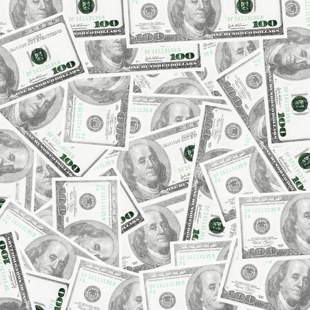 One hundred dollars pile as backgroundの写真素材
