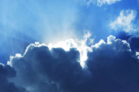 blue sky with sun light and beautiful cloudsの写真素材