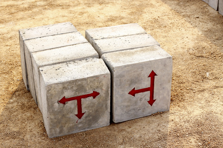 red arrow three way direction on Concrete blockの写真素材