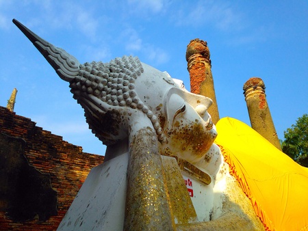 Stone statue of a Buddha at old temple Ayutthaya Thailandの素材