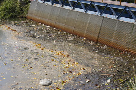 Bad environment waste canal many junk in canalの写真素材
