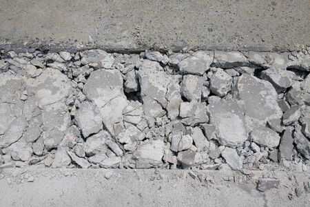 Concrete road is broken for repair at construction site.の写真素材