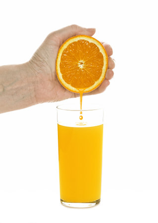 To wring out orange juiceの写真素材