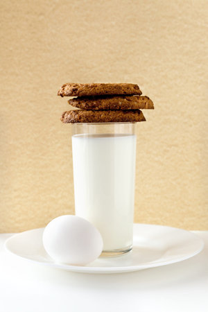 Breakfast with milk, egg and cookies
