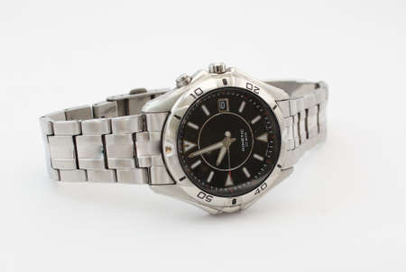 An isolated modern watch An isolated modern watch