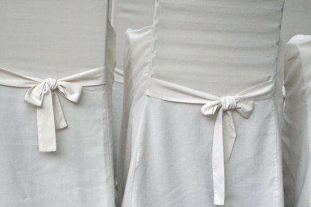 Decorated chairs on a wedding receptionの写真素材