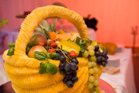 Fruit basket carved from pumpkinの写真素材