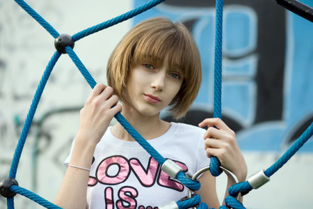Teenage girl on the playgroundの写真素材
