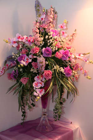 Wedding bouquet made of pink roses and orchidsの写真素材