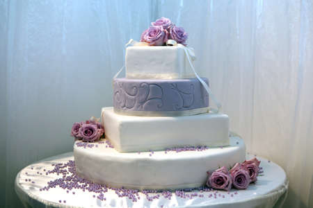 Beautiful wedding cake decorated with rosesの写真素材
