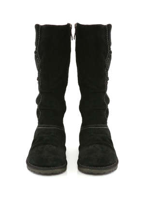 Female leather boots on a thick sole isolated on whiteの写真素材