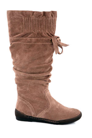 Female leather boot isolated on whiteの写真素材