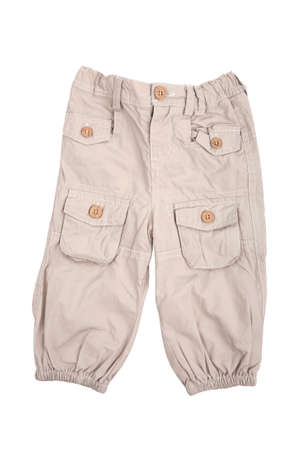 Beige baby trousers isolated on whiteの写真素材