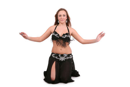 Beautiful belly dancer with long blond hair, isolated on whiteの写真素材