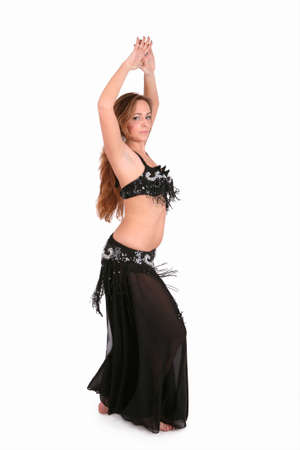 Beautiful belly dancer with long blond hair, isolated on whiteの写真素材