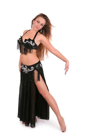 Attractive belly dancer with long blond hair, isolated on whiteの写真素材