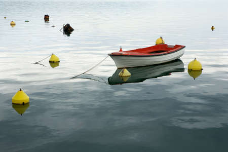 Lonely boat in the waterの写真素材