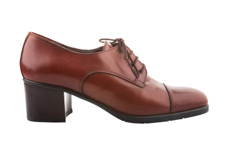 Vintage female shoe isolated on whiteの写真素材