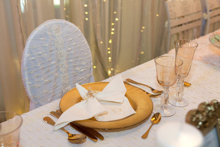 Luxurious wedding dinner in golden themeの写真素材