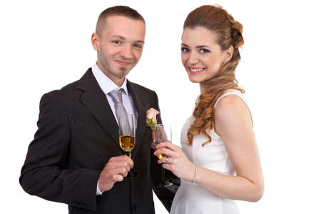 Young wedding couple with champagne glassesの写真素材