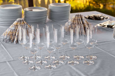 Empty champagne glasses on a tableの写真素材