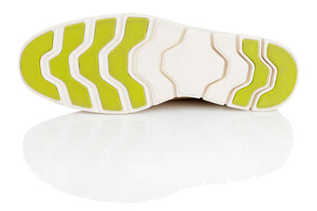 Shoe sole isolated on white with reflectionの写真素材