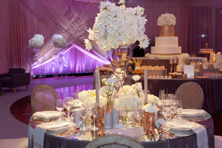 Table set for an event party or wedding reception, luxury elegant table setting dinnerの写真素材