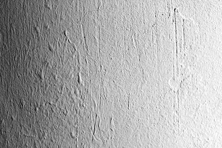 Old white surface background. White texture with scratches and cracks. Distressed grunge texture background.の写真素材