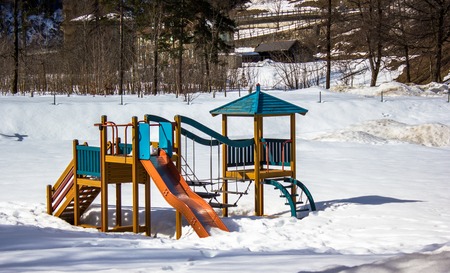 games for children, isolated in a park with snowの写真素材