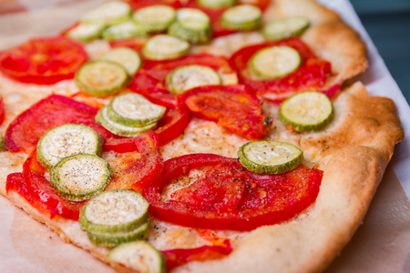 The pizza is a typical salty delicacy of Neapolitan cuisineの写真素材