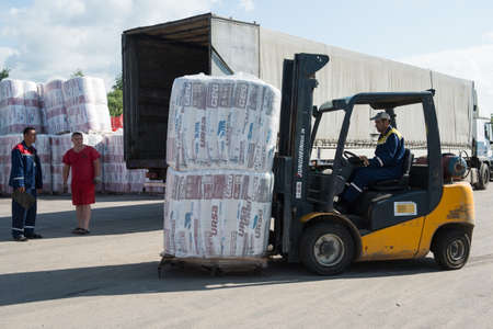 St. Petersburg, Russia-July 16, 2015: Warehouses building network of hypermarkets "metric",  supervisors and drivers  are working in warehouses.のeditorial素材