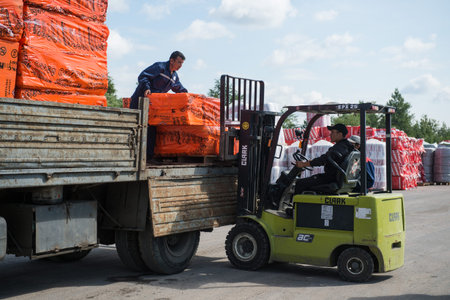 St. Petersburg, Russia-July 16, 2015: Warehouses building network of hypermarkets "metric",  supervisors and drivers  are working in warehouses.のeditorial素材