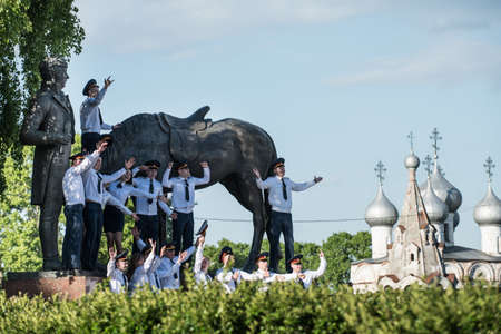 Vologda, Russia - May 25, 2015: Kremlin's Cathedral Square, Police Academy Graduates photographed against the backdrop of the monument to the Russian poet Konstantin Batyushkovのeditorial素材