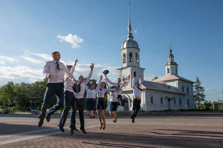 Vologda, Russia - May 25, 2015: Kremlin's Cathedral Square, Police Academy Graduates bounce against the backdrop of the Kremlin for photographyのeditorial素材
