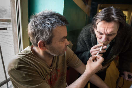 St. Petersburg, Russia - December 24, 2014: homeless shelters, a portrait of a homeless manのeditorial素材