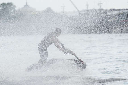 St. Petersburg, Russia - June 7, 2013: Shaw sportsmen racers aquabikes on the Neva River - flips, tricks, Death Defying Acts.のeditorial素材