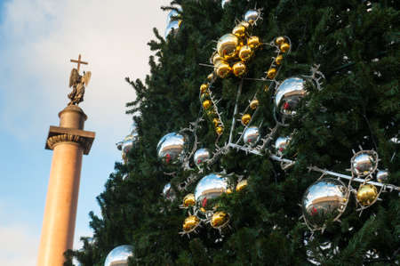 St. Petersburg, Russia - December 7, 2015: Palace Square decorated Christmas tree against the backdrop of an angelのeditorial素材